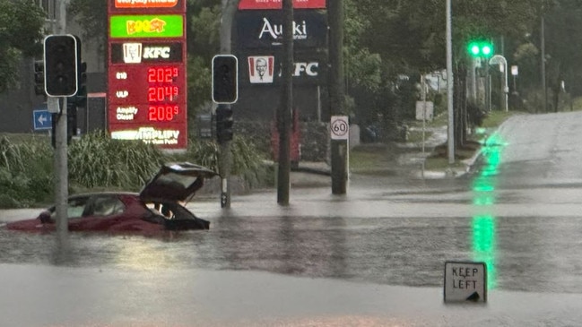 A car caught in flash flooding at Newmarket. Picture: Supplied