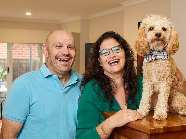 Alex and Sophie Savvas with their dog, Benji, 10 months, at home in Plympton, where theyÃve invested over many years while working, Tuesday, March 7, 2023. Picture: Matt Loxton