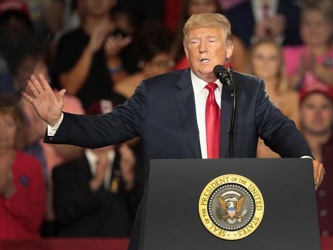 LEWIS CENTER, OH - AUGUST 04: President Donald Trump speaks at a rally to show support for Ohio Republican congressional candidate Troy Balderson on August 4, 2018 in Lewis Center, Ohio. Balderson faces Democratic challenger Danny O'Connor for Ohio's 12th Congressional District on Tuesday.   Scott Olson/Getty Images/AFP == FOR NEWSPAPERS, INTERNET, TELCOS & TELEVISION USE ONLY ==