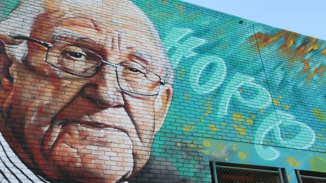 A mural of former PM Malcolm Fraser on the wall of the Asylum Seekers Centre in Footscray. Picture: MARK WILSON