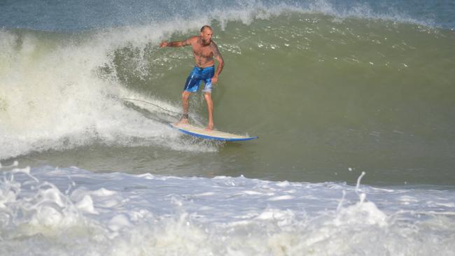 Gove surfer Chris McSherry was one of many surfers on Friday making the most out of Cyclone Trevor while out surfing the break Tourette’s. Picture: Scott Morris