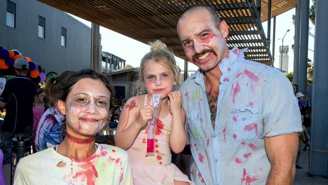 Lilah Reynolds, Caylee Reynolds and Craig Reynolds from Racecourse at Mackay Charity Zombie Walk. Saturday, October 30, 2021. Picture: Michaela Harlow