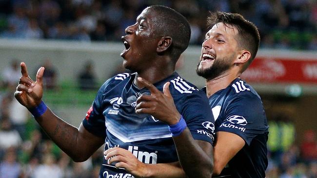 Melbourne Victory star Leroy George (left) celebrates his goal on Friday night with teammate Matias Sanchez.