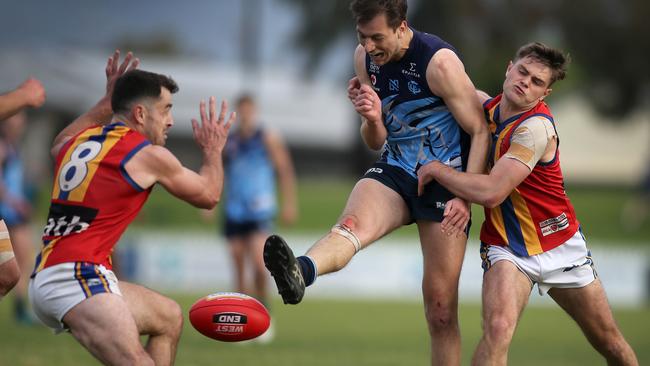 Hugh Ferrari tackles Glenunga’s Harry Prosser. Picture: Dean Martin