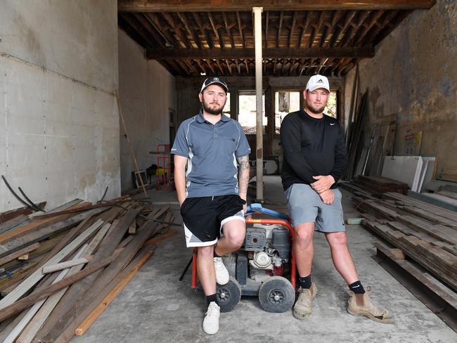 Brodie Jankovic and Kayle Wright during the transformation of the historic Queens Building. Picture: Shae Beplate.