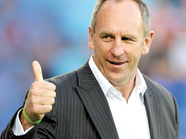 GOLD COAST, AUSTRALIA - AUGUST 24: Titans coach John Cartwright gives a acknowledges the crowd before the round 24 NRL match between the Gold Coast Titans and the New Zealand Warriors at Skilled Park on August 24, 2013 on the Gold Coast, Australia. (Photo by Matt Roberts/Getty Images)