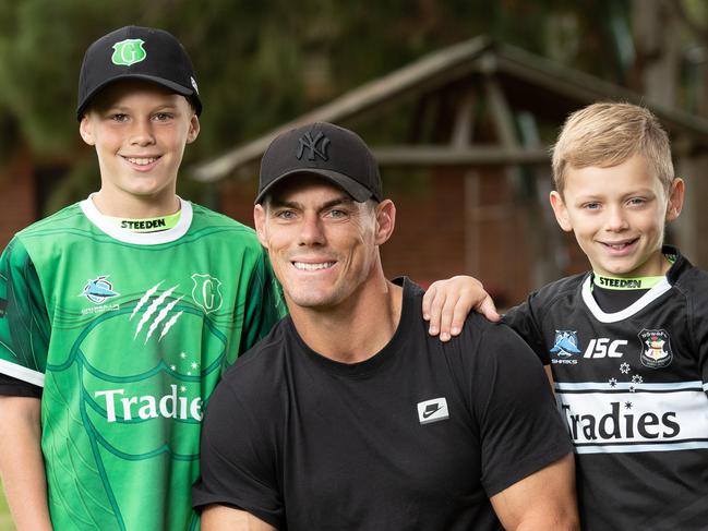 Cronulla Sharks coach John Morris with his sons Cruz who plays for the Gymea Gorillas U/11s (green shirt) and Taj who plays for Cronulla Carringbah U/9s (dark top). Picture: Julian Andrews)