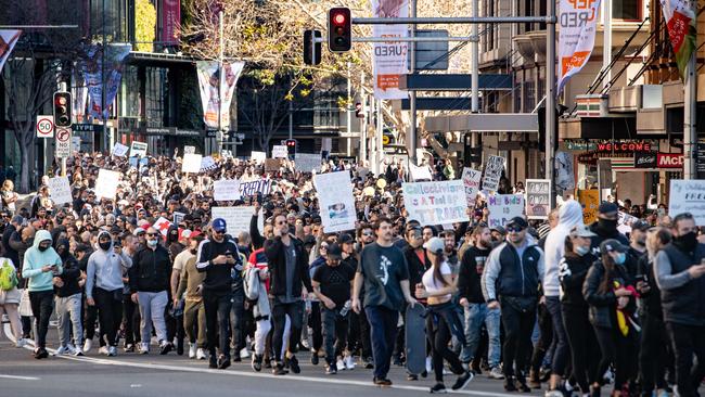 Protesters march through Sydney’s CBD. Picture: Julian Andrews