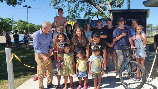 Maisie Monaghan helps Clarence MP Chris Gulaptis cut the ribbon to officially open the relocated youth hubs while being watched on by some excited Clarence Valley youth and Clarence Valley Mayor Jim Simmons.