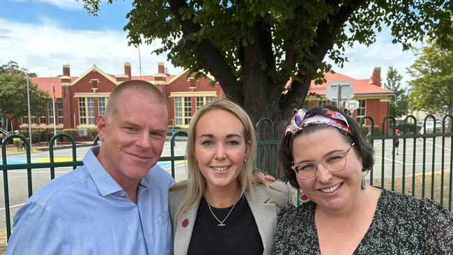 Greens MP Vica Bayley, candidate Tabatha Badger and mother of three Siobhan Marriot outside Campbell St Primary in Hobart on Tuesday, February 20, 2024.