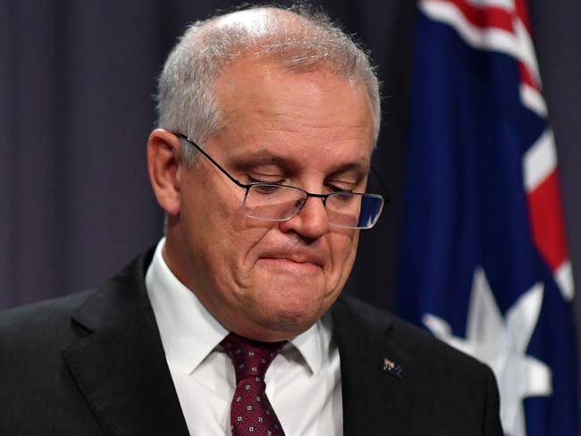 CANBERRA, AUSTRALIA - MARCH 23: Prime Minister Scott Morrison during a press conference at Parliament House on March 23, 2021 in Canberra, Australia. The federal government was yesterday set back by new allegationsÃÂ broadcastÃÂ by the Ten Network after pixelated images of unnamed Coalition advisers allegedly engaging in performing lewd sex acts on the desks of female MPs resulting in a Morrison staff member being sacked last night. Additionally, the ABC Network aired a first hand account by an Australian Parliament security guard of what she witnessed on the night Brittany Higgins was allegedly raped in the office of then-defence industry minister Linda Reynolds in early 2019. (Photo by Sam Mooy/Getty Images)