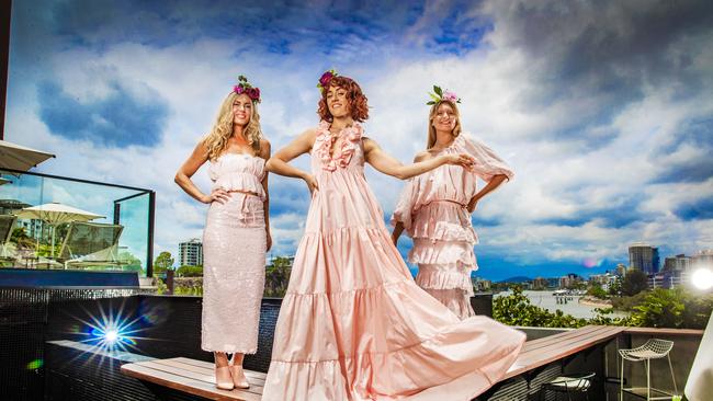 Sarah Knobel (left), Demi Jenkins (centre) and Victoria Lewis (right) strut their stuff in beautiful pale pink dresses from local label White Label Noba. Picture: Nigel Hallett
