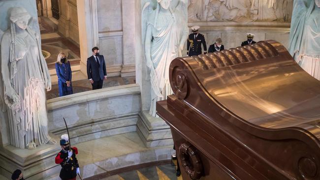 Emmanuel Macron and wife Brigitte stand in front of the tomb of French Emperor Napoleon last Wednesday during a ceremony marking the 200th anniversary of his death in the "Chapelle Saint-Jerome" at the Invalides in Paris. Picture: AFP