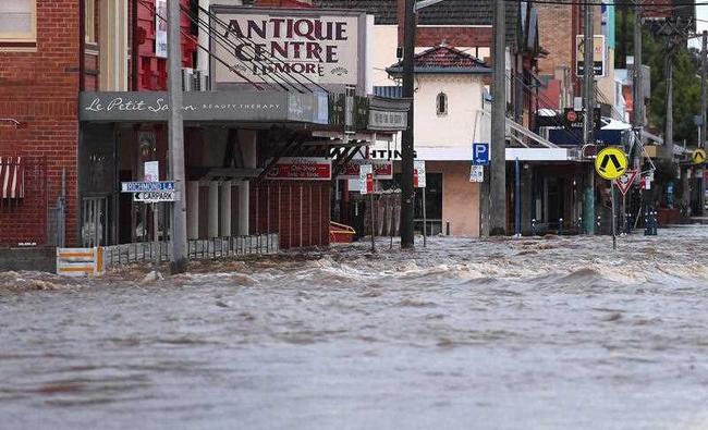 Lismore CBD was flooded after the Wilson River breached its banks early Friday, March 31, 2017. Picture: AAP Image/Dave Hunt