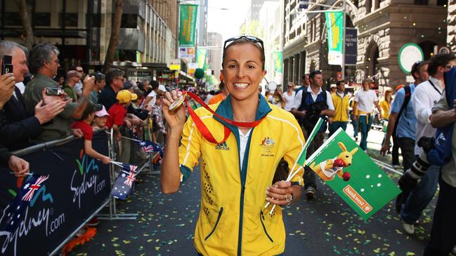 Triathlon gold medallist Emma Snowsill during the Australian Olympic Team homecoming parade along George Street in the Sydney CBD in 2000.