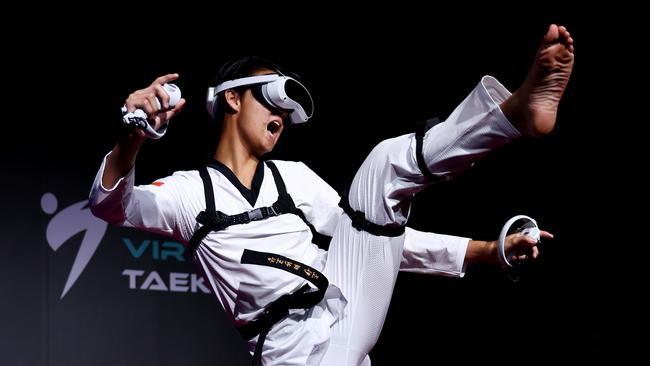 Team Singapore’s Alexander Tang competes in the Virtual Taekwondo qualifying rounds on day two of the Olympic Esports Week. Picture: Getty