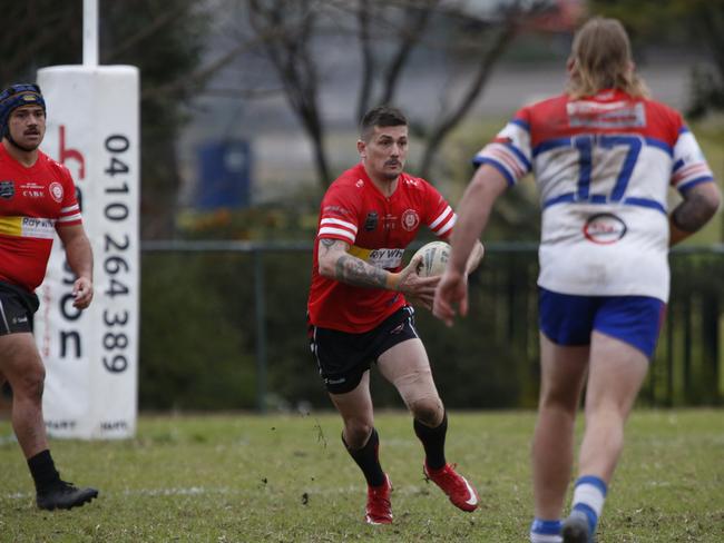 Robert Henderson heads upfield. Picture: Warren Gannon Photography