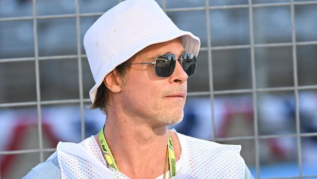 US actor Brad Pitt looks from the pit wall during the second practice session for the Formula One United States Grand Prix.