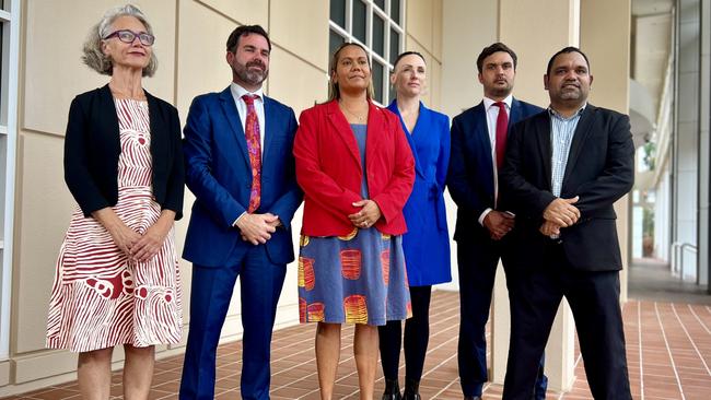 Independent MLA Justine Davis, Gwoja MLA Chansey Paech, Opposition Leader Selena Uibo, Greens MLA Kat McNamara, Deputy Opposition Leader Dheran Young, and Arafura MLA Manuel Brown. A coalition of opposition and crossbench NT politicians are calling for a bipartisan approach to tackle domestic violence. Picture: Fia Walsh.