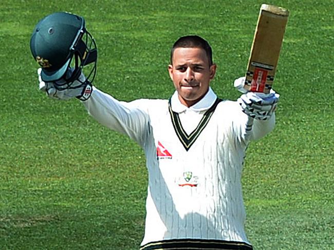 Australian batsman Adama Voges looks on as Usman Khawaja (left) reacts after scoring a century on day 2 of the first Test Match between Australia and New Zealand at the Basin Reserve in Wellington, Saturday, Feb. 13, 2016. (AAP Image/Dave Hunt) NO ARCHIVING, EDITORIAL USE ONLY, IMAGES TO BE USED FOR NEWS REPORTING PURPOSES ONLY, NO COMMERCIAL USE WHATSOEVER, NO USE IN BOOKS WITHOUT PRIOR WRITTEN CONSENT FROM AAP