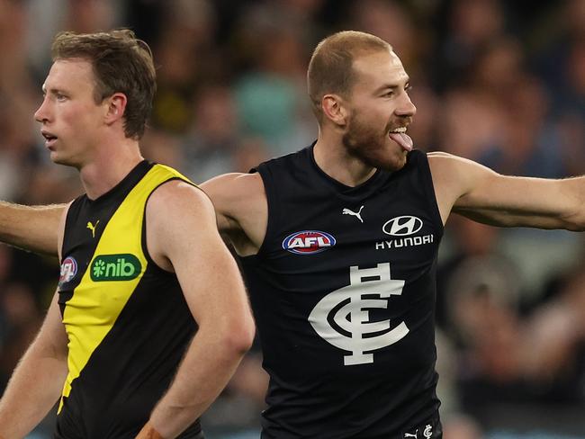 MELBOURNE, AUSTRALIA – MARCH 14: Harry McKay of the Blues celebrates after scoring a goal during the round one AFL match between Carlton Blues and Richmond Tigers at the Melbourne Cricket Ground, on March 14, 2024, in Melbourne, Australia. (Photo by Robert Cianflone/Getty Images)