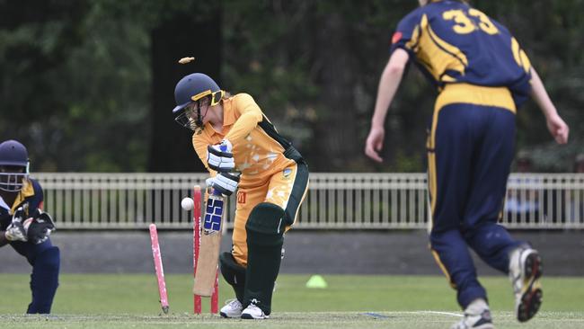 North Coastal’s Riely McLeod is bowled out by Central Coast’s Layla Graham. Picture: Martin Ollman