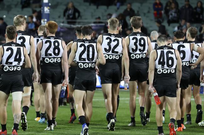 Port Adelaide walk off after the loss. to Adelaide in Showdown 46 at Adelaide Oval. Picture Sarah Reed