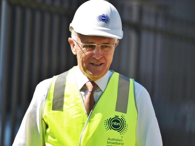 The PM has been spending a lot of time playing political football with the NBN lately. He would love to lay the blame on Labor. Picture: Mick Tsikas / AAP