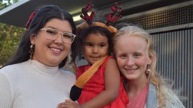 Yasmin and Micciah Daniels and Taelyn Bailey at Christmas in the Park 2022.