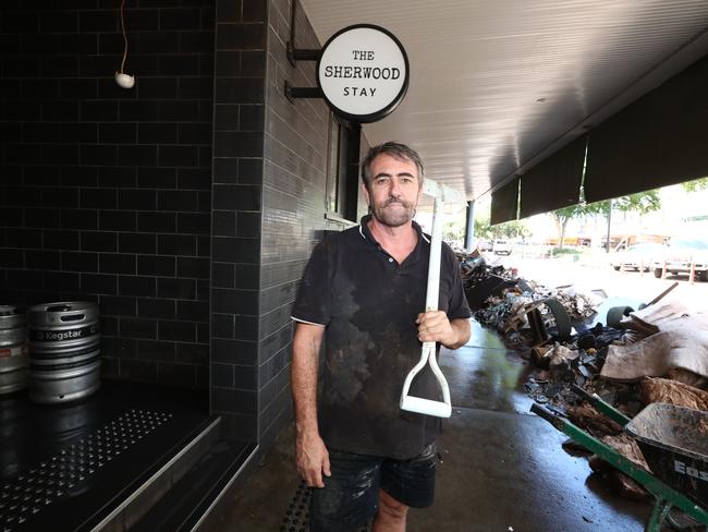 Andrea Rufo cleaning up in Lismore. Picture: Jason O'Brien