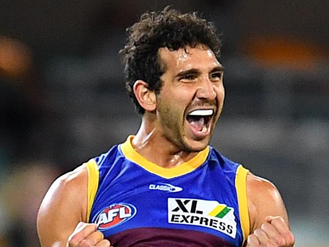 BRISBANE, AUSTRALIA - AUGUST 14: Nakia Cockatoo of the Lions celebrates after kicking a goal after kicking a goal during the round 22 AFL match between Brisbane Lions and Collingwood Magpies at The Gabba on August 14, 2021 in Brisbane, Australia. (Photo by Albert Perez/AFL Photos via Getty Images)