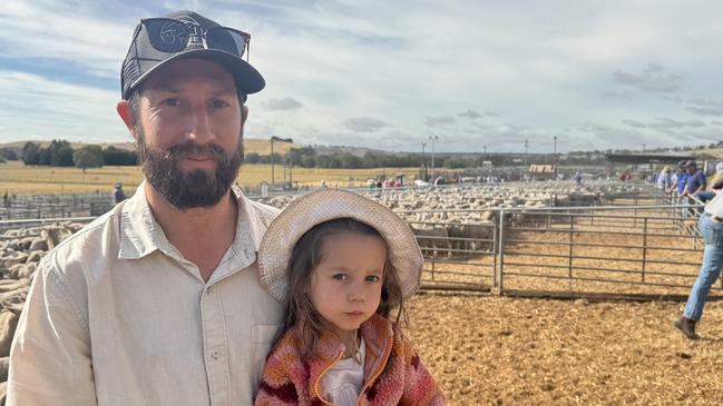 Chris McLeod, Moutajup, and Margot, 2.5, looking to buy at the Casterton sheep sale.