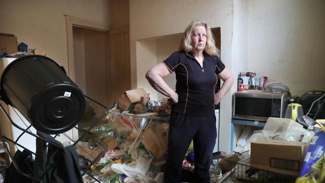 Kim Woodcock owner of the property in the kitchen of the house. Rental property in Hobart was been left with huge amounts of rubbish after the tenant vacated in August. Picture: Nikki Davis-Jones