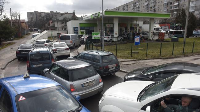 People queue to a petrol station in the western Ukrainian city of Lviv. Picture: AFP