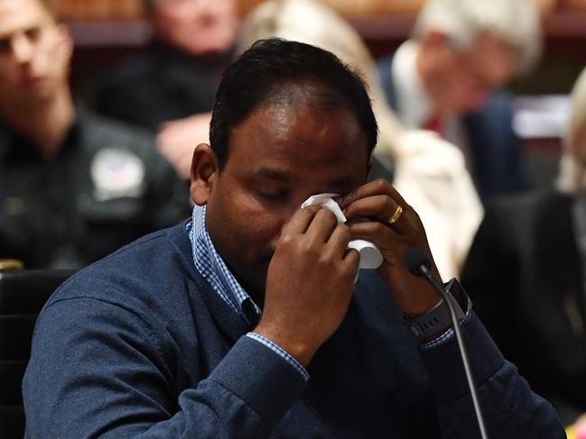 An emotional Vijay Vital, who owns a unit in Mascot Towers, wipes away tears after delivering his opening statement to the inquiry. Picture: AAP/Dean Lewins