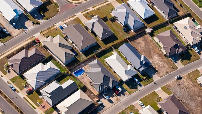 Aerial photograph of a suburban housing development in Townsville, Australia.