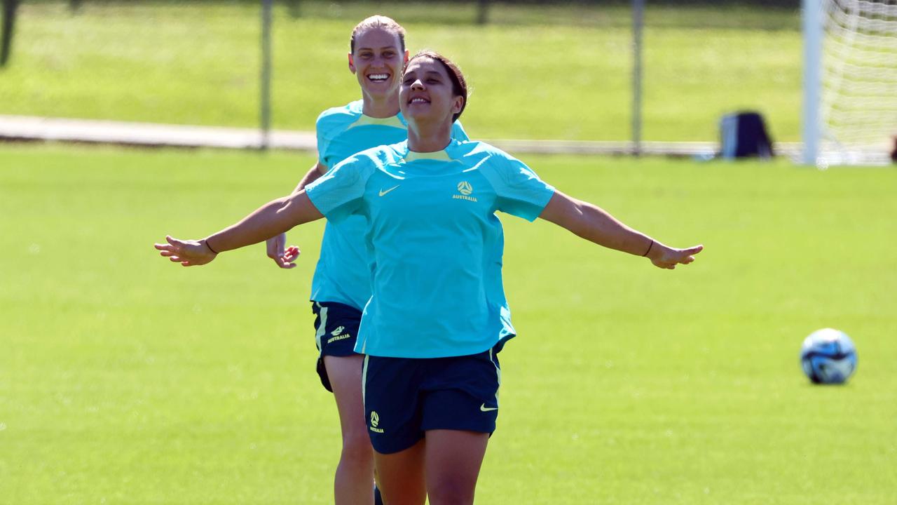 Sam Kerr and Emily van Egmond, behind, during the Matildas Training session in Brisbane. Picture: NCA NewsWire/Tertius Pickard