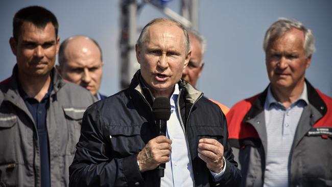 Russian President Vladimir Putin speaks during the opening ceremony of the road-and-rail Crimean Bridge over the Kerch Strait in 2018. In October 2022, it was partially destroyed by a truck bomb in an attack Moscow blamed on Ukraine, an accusation Kyiv denied. Picture: Alexander Nemenov/AFP