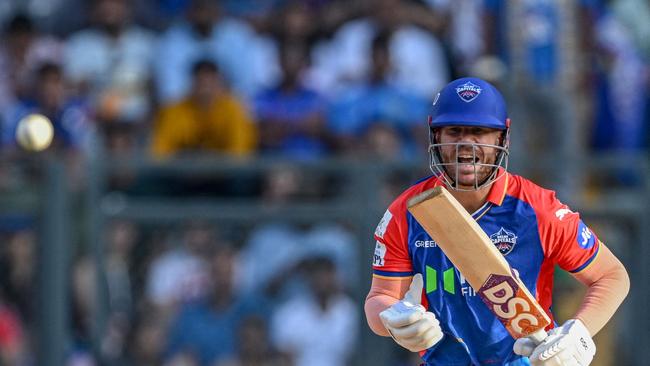 Delhi Capitals' David Warner reacts after playing a shot during the Indian Premier League. (Photo by INDRANIL MUKHERJEE / AFP)