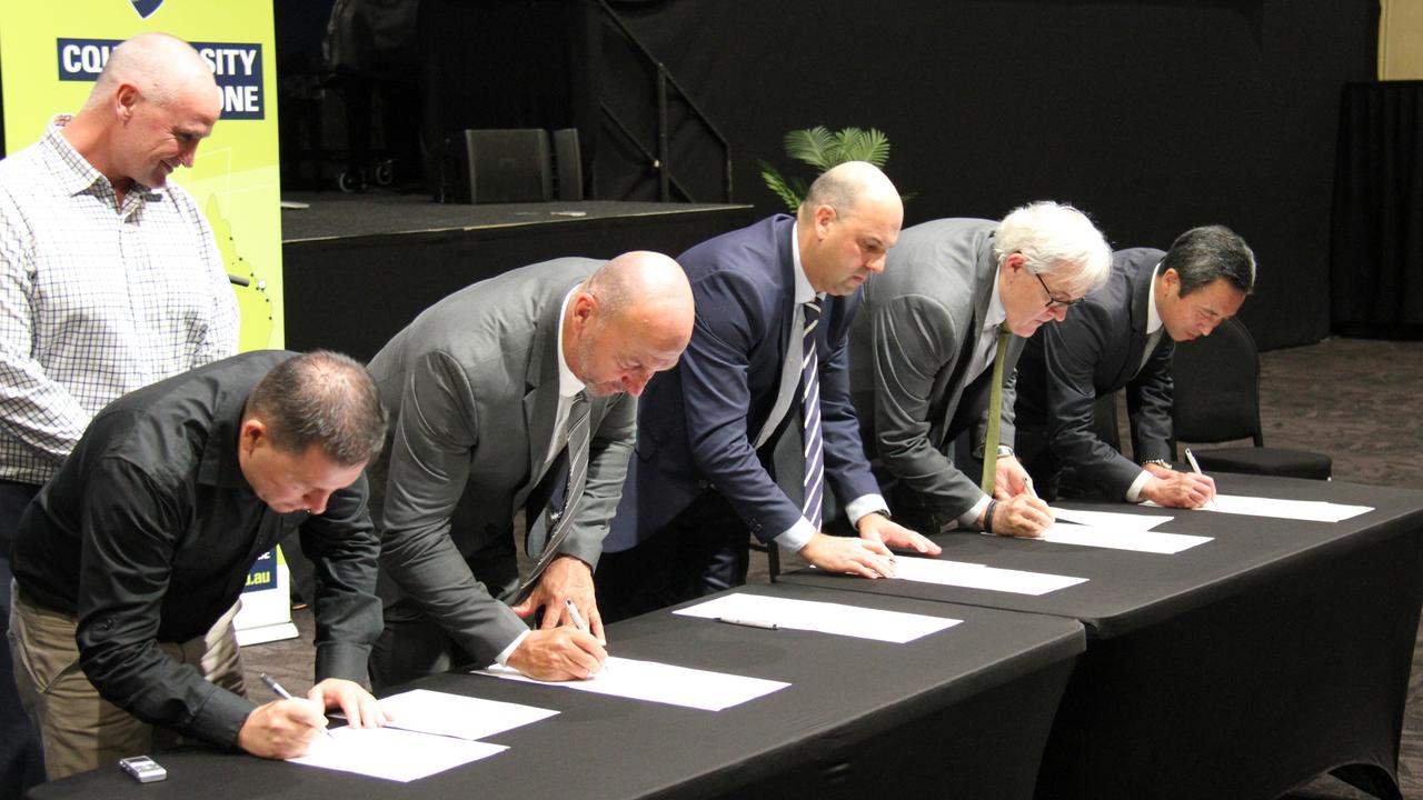 Regional Development, Manufacturing and Water Minister, Member for Gladstone Glenn Butcher oversees the signing of the memorandum of understanding for the Gladstone Hydrogen Ecosystem project by (l to r) Gladstone Mayor Matt Burnett, Gladstone Ports Corporation acting Chief Executive Craig Walker, Australian Gas Infrastructure Group Executive General Manager Craig de Laine, CQ University Vice President Global Development Alastair Dawson and Sumitomo Corporation Australia Managing Director Yoshikazu 'Cash' Ishikawa in Gladstone on March 17, 2021. Picture: Rodney Stevens