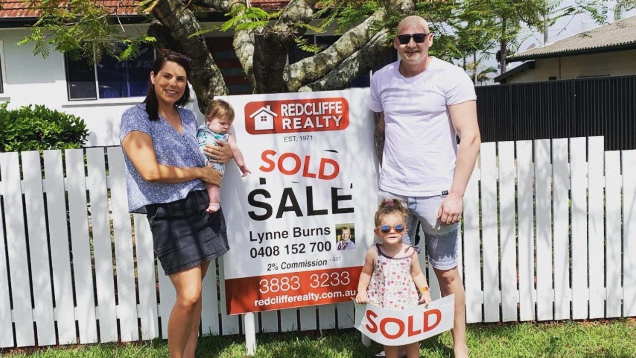 Brendan Nikolajew, wife Leah and their two children Georgie and Roman at their new home just days before his terminal diagnosis. Picture: GoFundMe