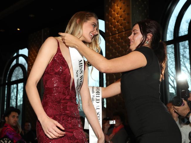 Alexandra Wallace receives her sash as a finalist. Picture: David Swift