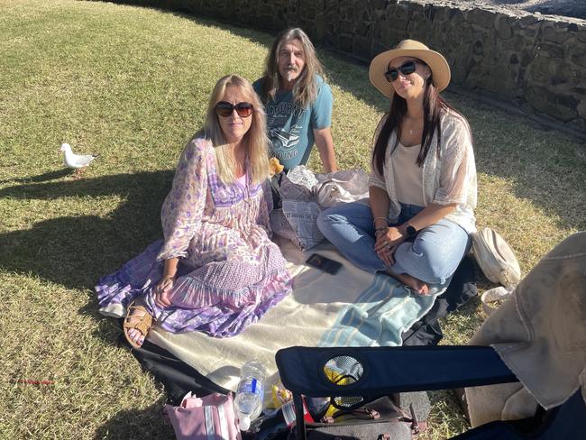 Samantha Sabo, Les Sabo and Leonnie Nodine at Cowes Foreshore on Phillip Island for the 2024 New Year's Eve fireworks. Picture: Jack Colantuono