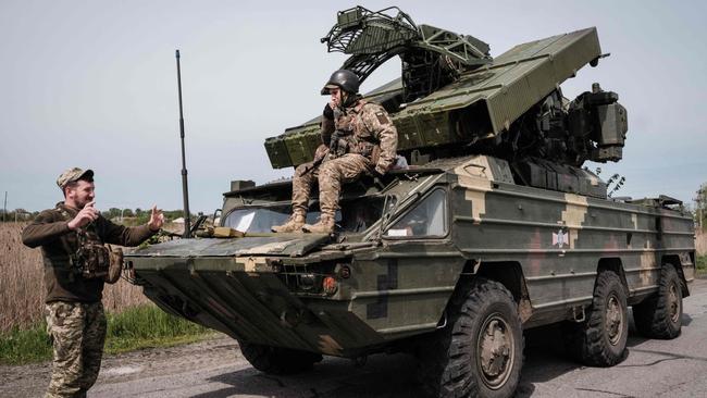 Ukrainian soldiers at an anti-aircraft missile system near Sloviansk, eastern Ukraine. Picture: AFP