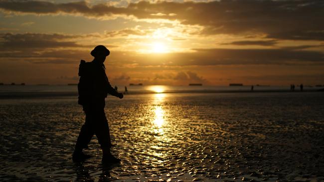 Dawn breaks over Gold Beach this morning on the 75th anniversary. Photo by Christopher Furlong/Getty Images