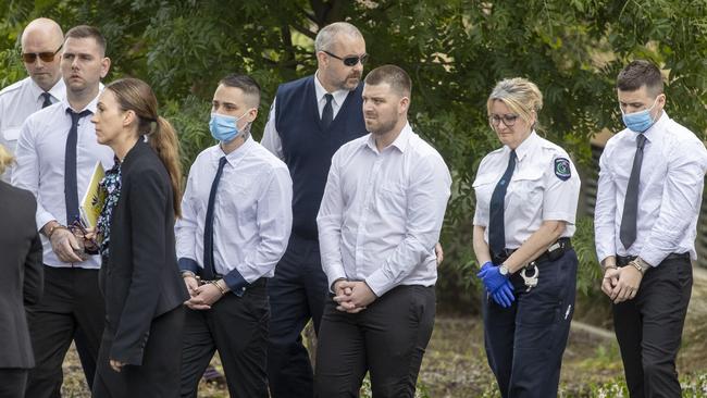 Thomas Nichols, Thomas Pinnington, Jeremy Dale Sandel and Kain Mazomenos, left to right in handcuffs, under guard during the trial. Picture: Picture: NCA NewsWire