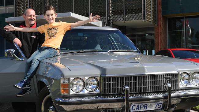 TRIBUTE: Holden worker Dave Depares and his son Nicholas, 11, check out a 1975 Statesman Capris. Picture: NAOMI JELLICOE