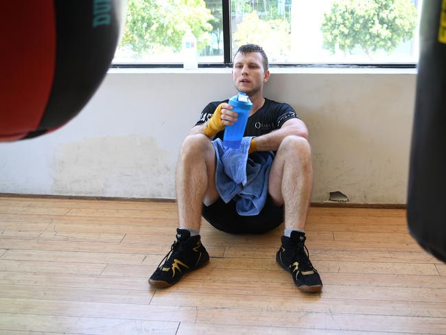 A weary Jeff Horn rests during training in Brisbane. (AAP Image/Dan Peled)