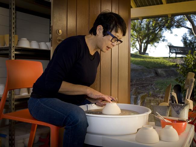 Mulan Gock at her pottery wheel at her studio at Mu Gallery at the artists’ precinct at Headland Park.