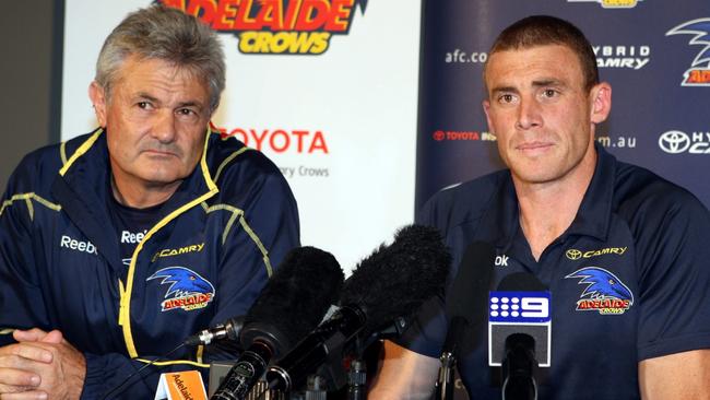 Crows captain Simon Goodwin announces his intention to retire at the end of the 2010 season, flanked by coach Neil Craig. Picture: Ray Titus